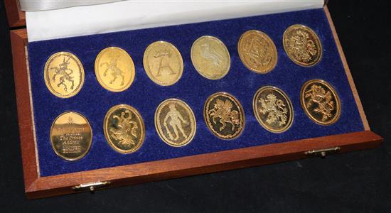 A cased silver-gilt set of the Arms of Prince Andrew & Sarah Ferguson and a 2001 Victorian Anniversary Crown